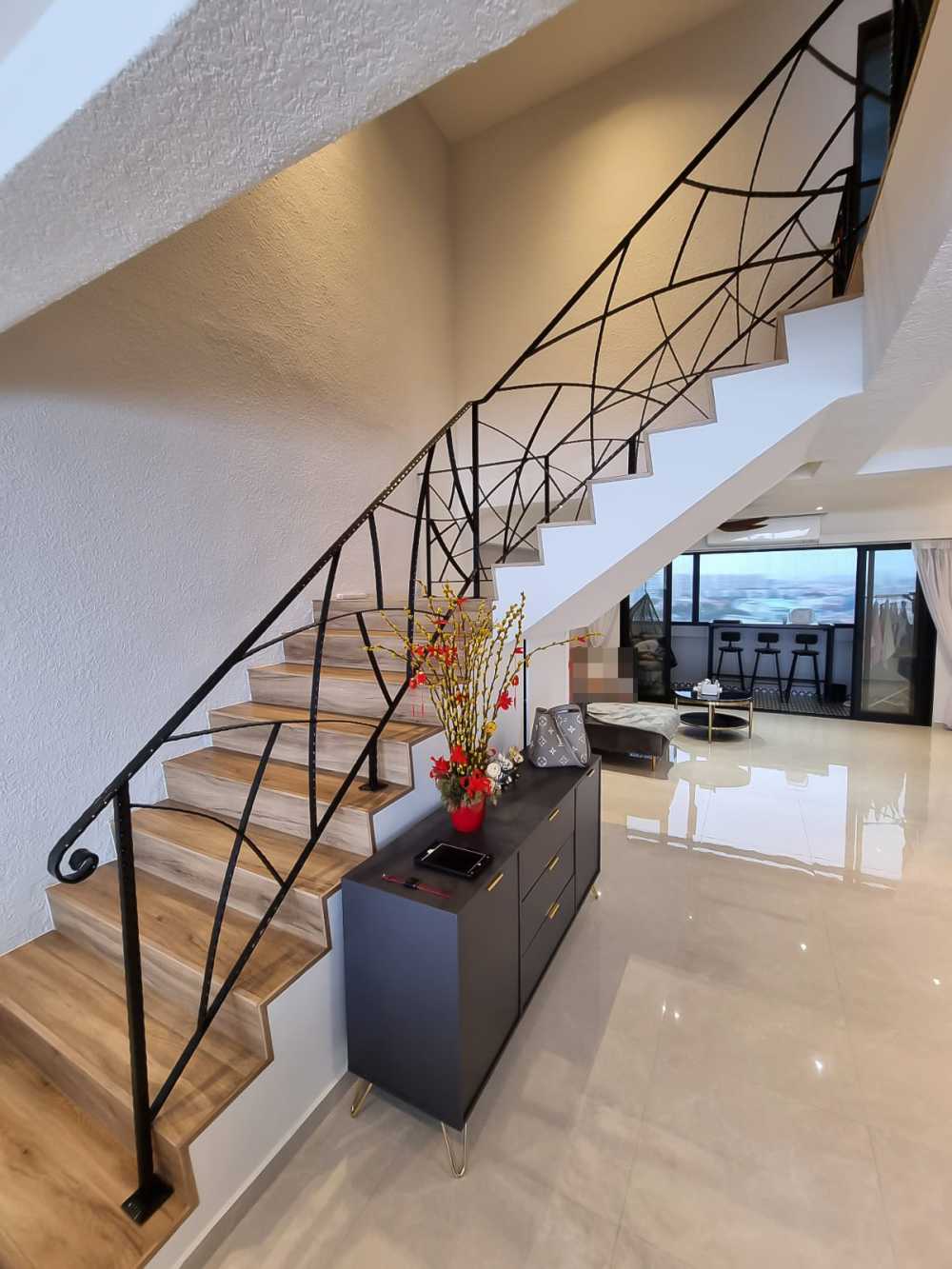 Scandinavian Hallway with Staircase and Paintings