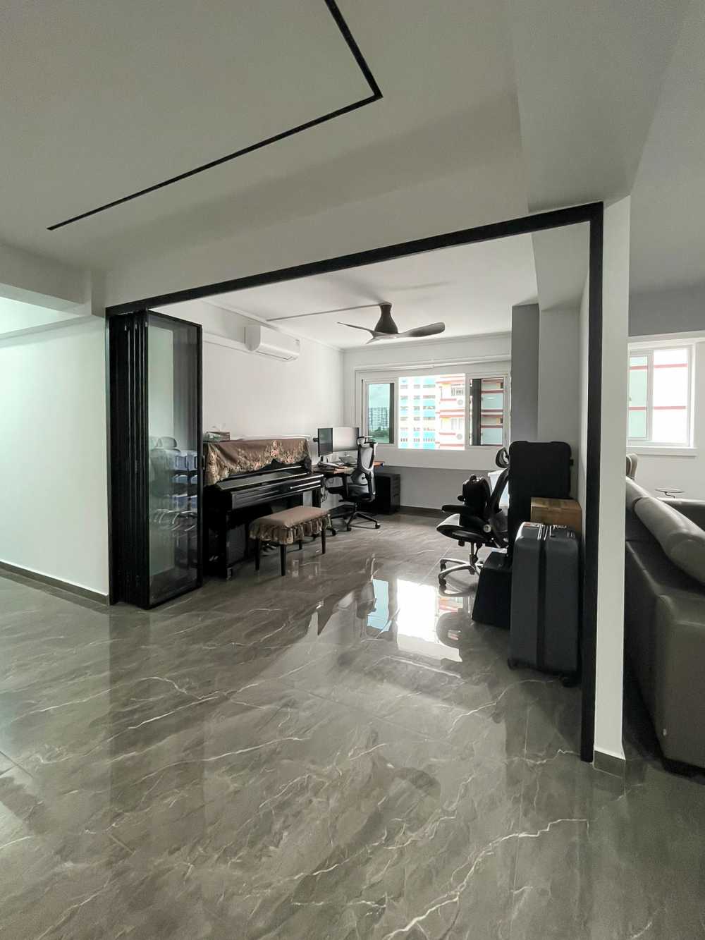 Scandinavian Living Room with Glass Door and Window Grille