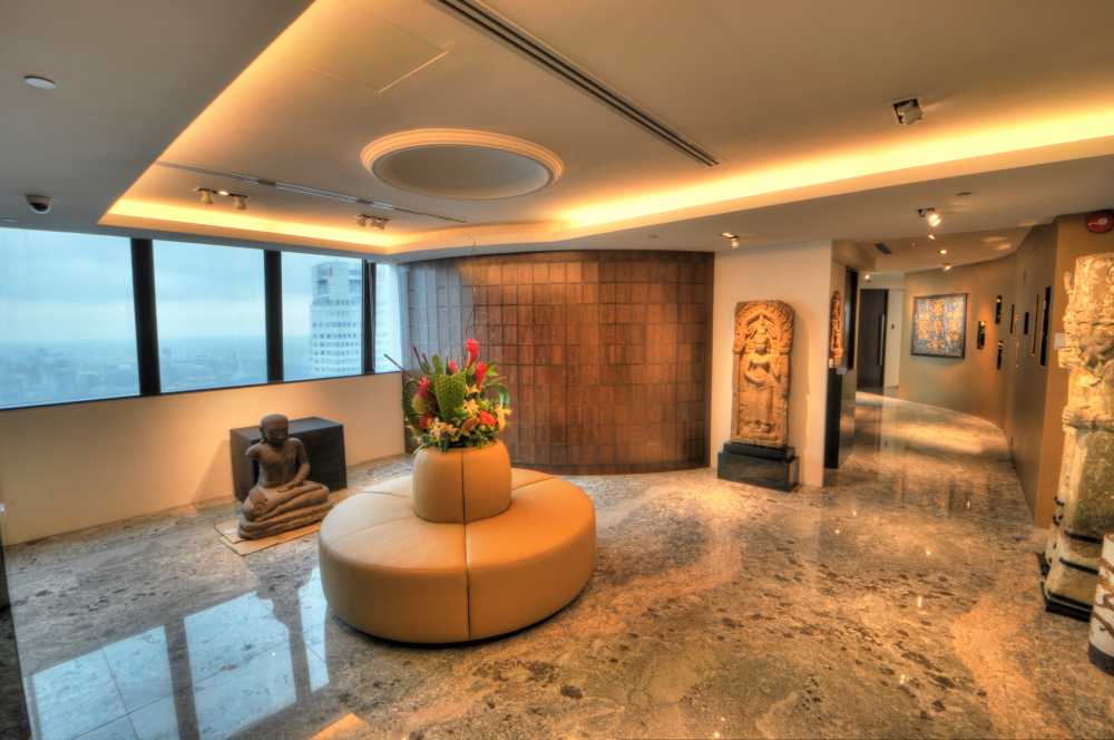 Asian Foyer with Marble Floor and Feature Wall