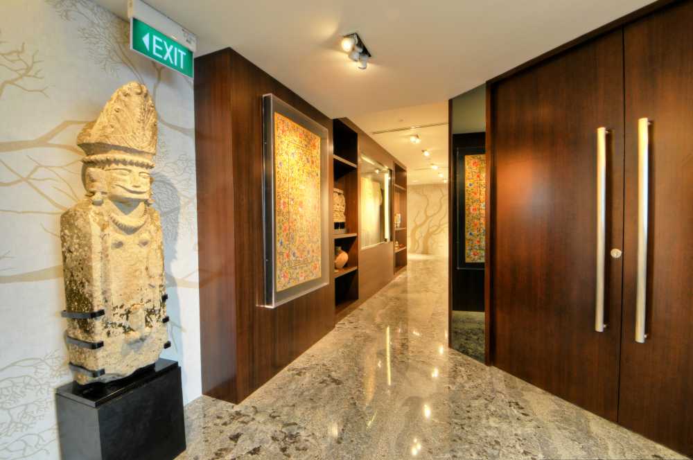 Asian Hallway with Bookshelf and Marble Floor