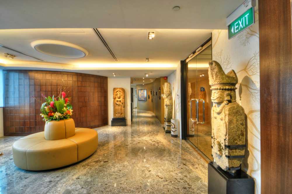 Asian Foyer with Marble Floor and Artwork