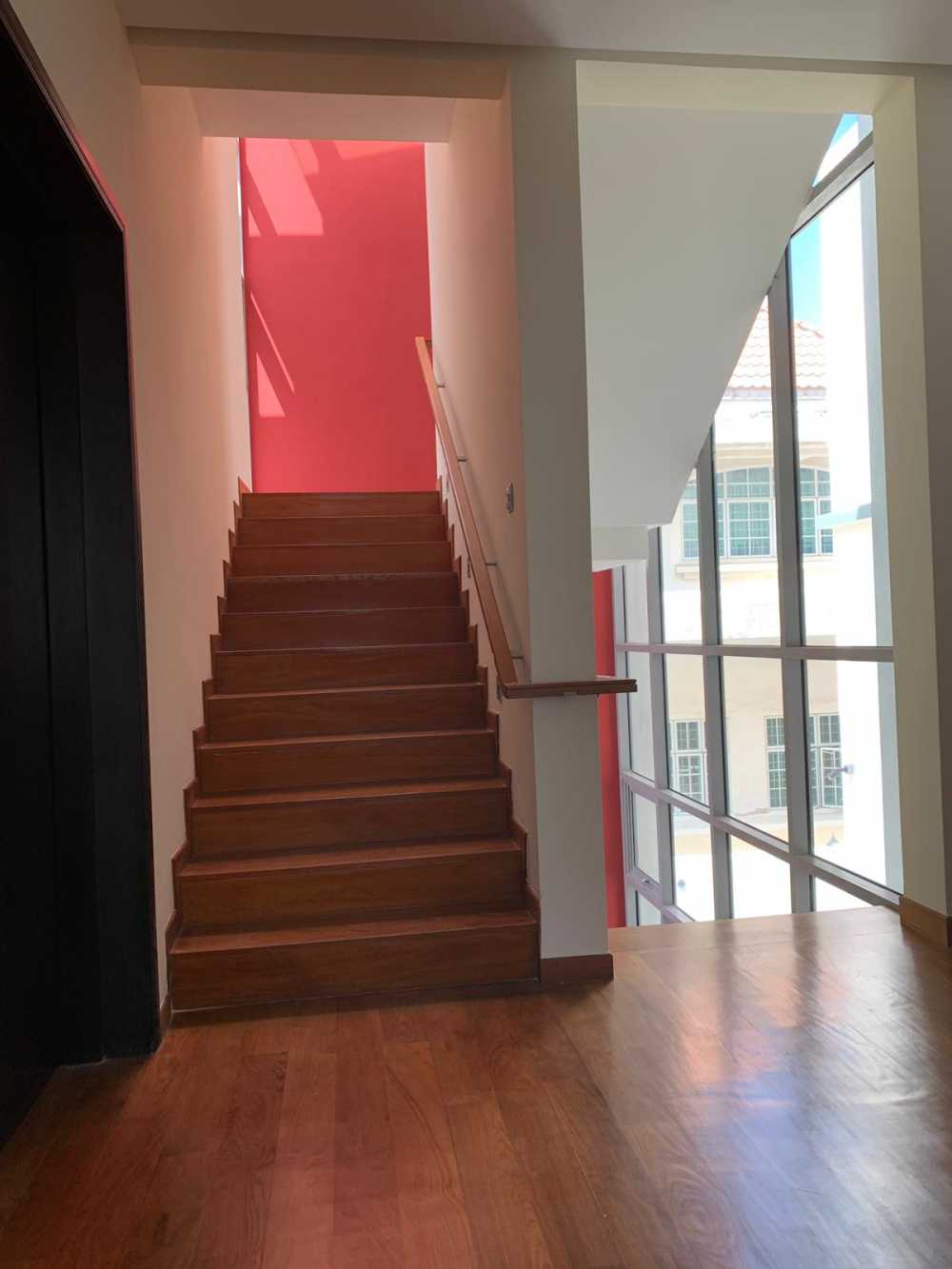 Modern Hallway with Wood Flooring and Staircase