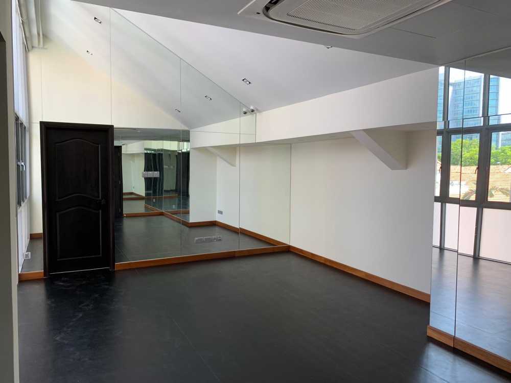 Modern Home Gym with Vinyl Flooring and Mirror