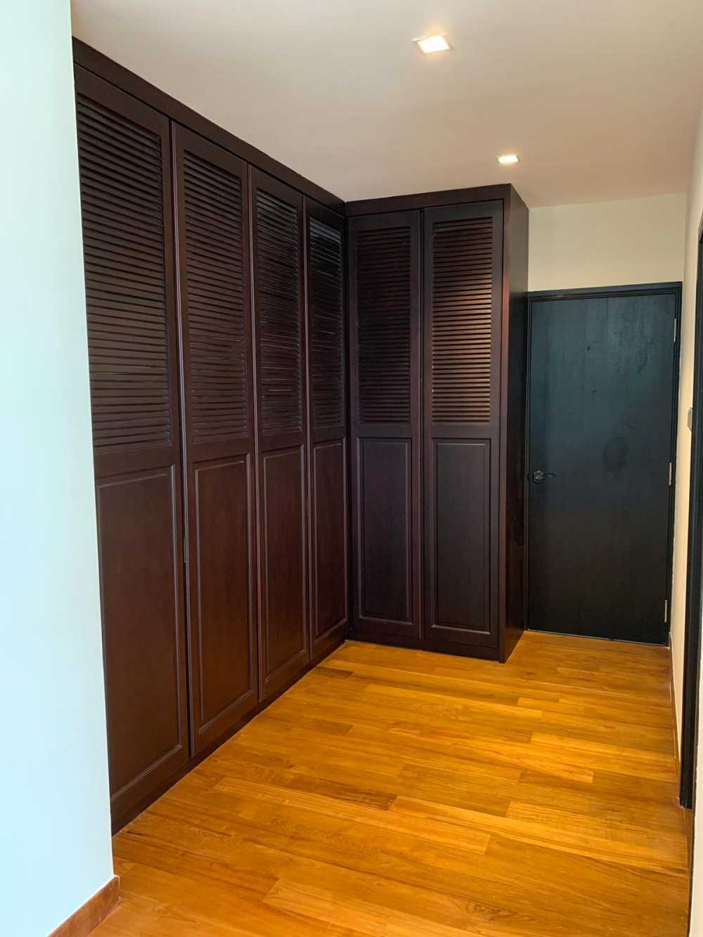 Modern Bedroom with Wood Flooring and Wardrobe