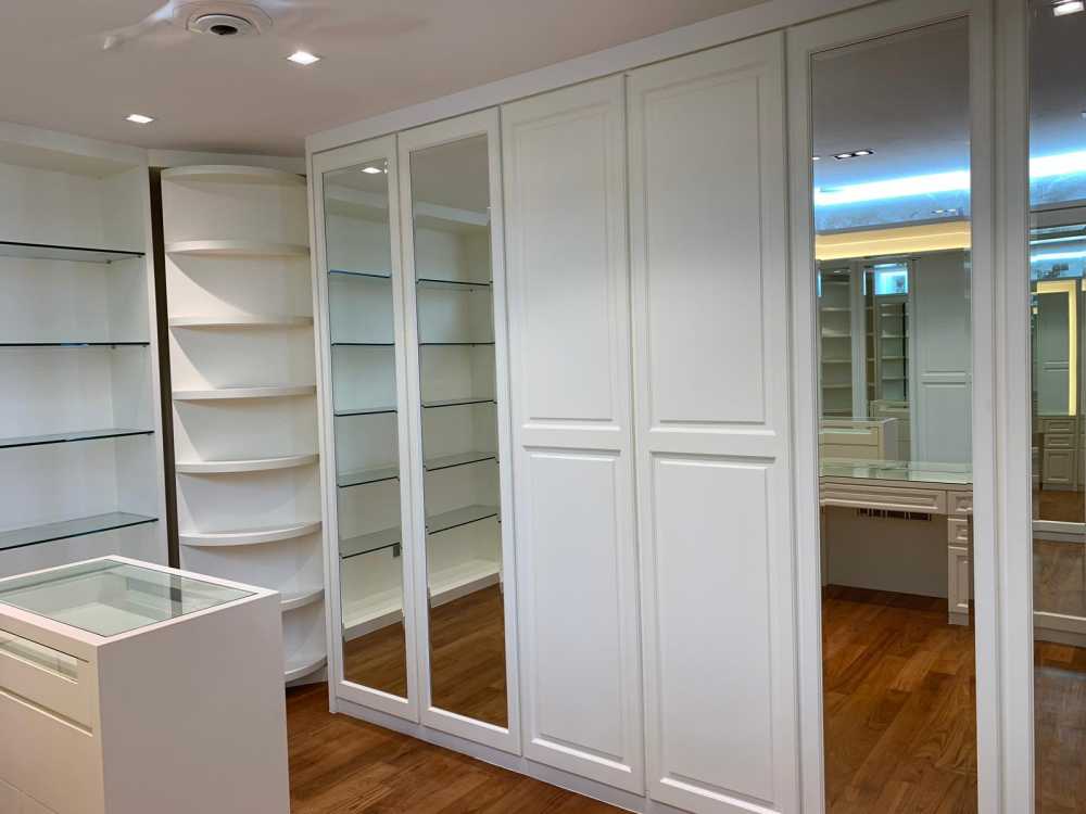 Modern Bedroom with Parquet Floor and Mirror