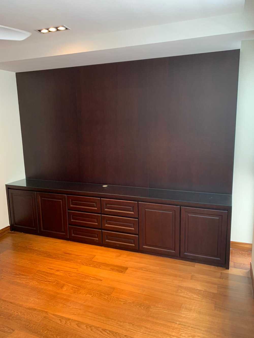 Modern Bedroom with Parquet Floor and TV Console