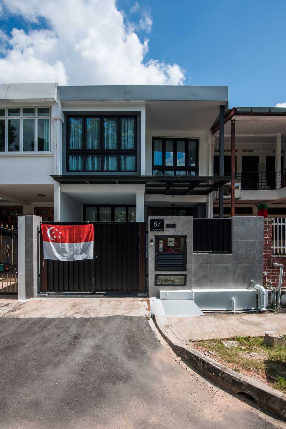 Contemporary Porch with Awning and Metal Gate