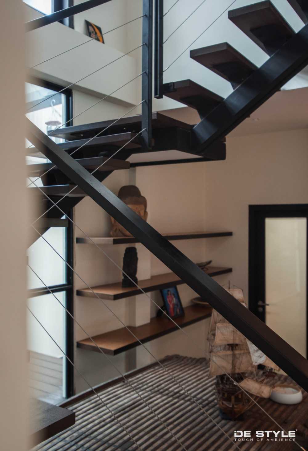 Asian Hallway with Staircase and Display Cabinets