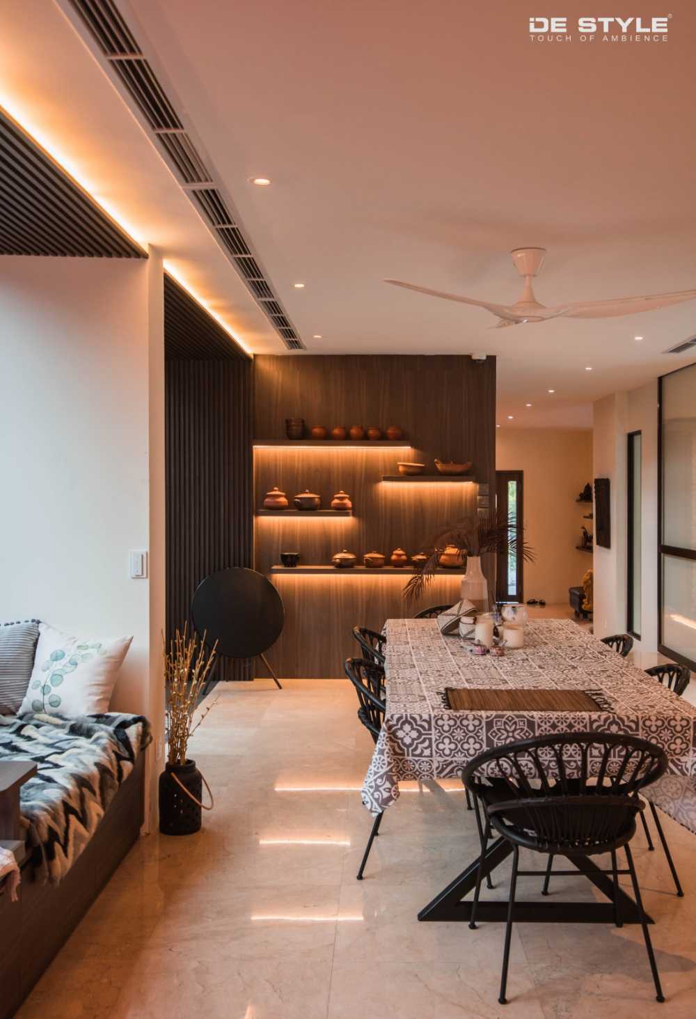 Asian Dining Room with Cove Lighting and Dining Table