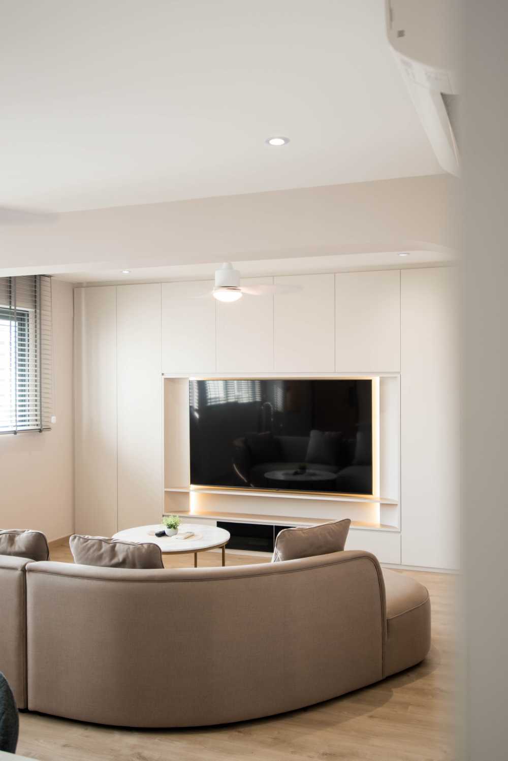 Minimalist Living Room with Vinyl Flooring and Feature Wall
