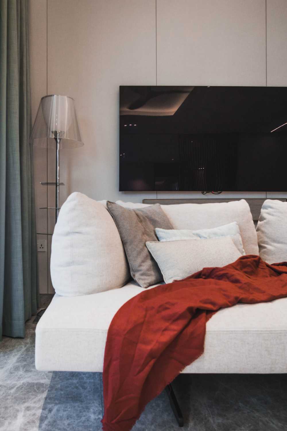 Minimalist Living Room with Marble Floor and Feature Wall