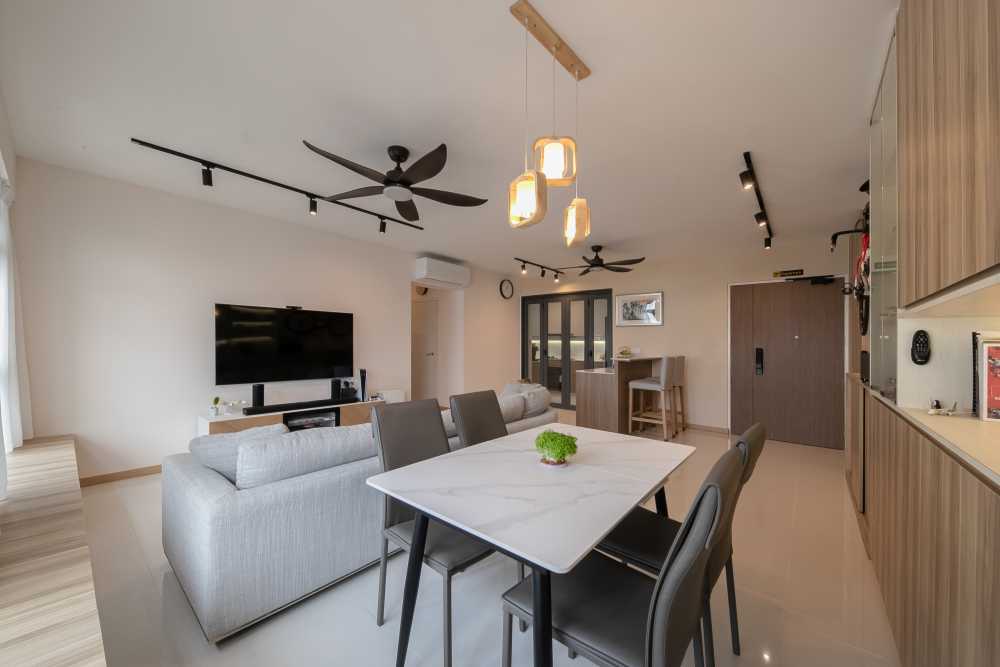 Minimalist Dining Room with TV Console and Chandelier