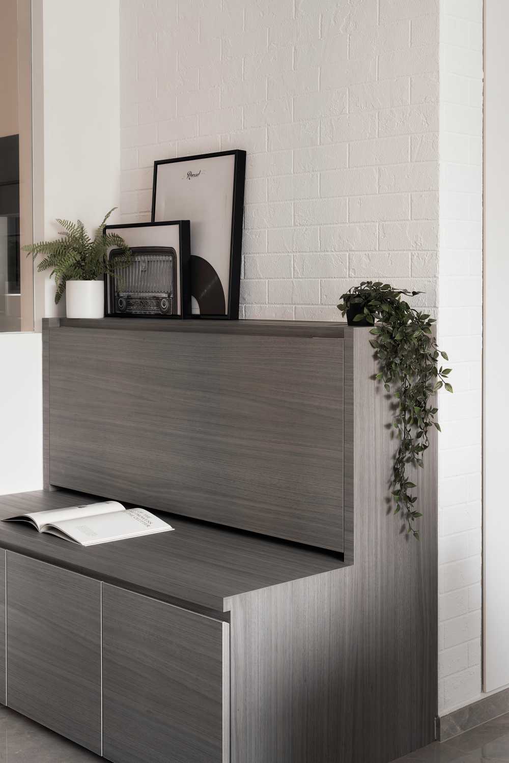 Modern Living Room with Bookshelf and Paintings