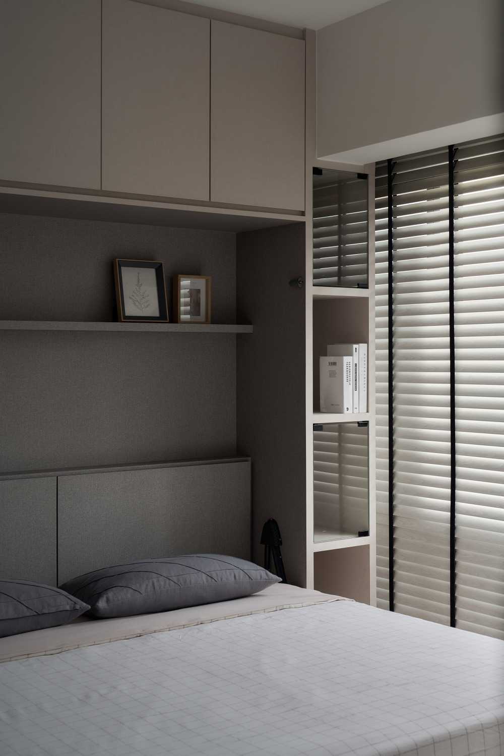 Modern Bedroom with Bookshelf and Platform Bed