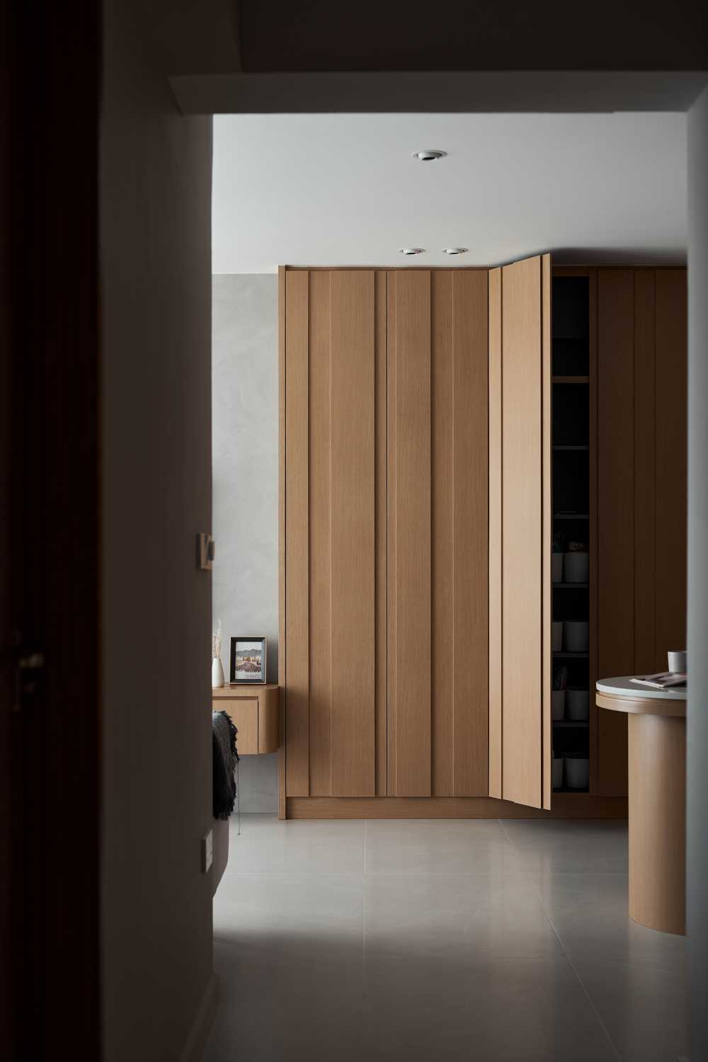 Scandinavian Living Room with Bookshelf and Ceiling Light