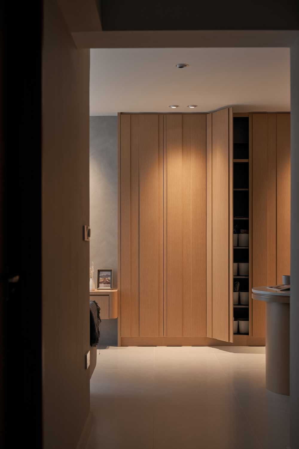 Scandinavian Living Room with Bookshelf and Ceiling Light