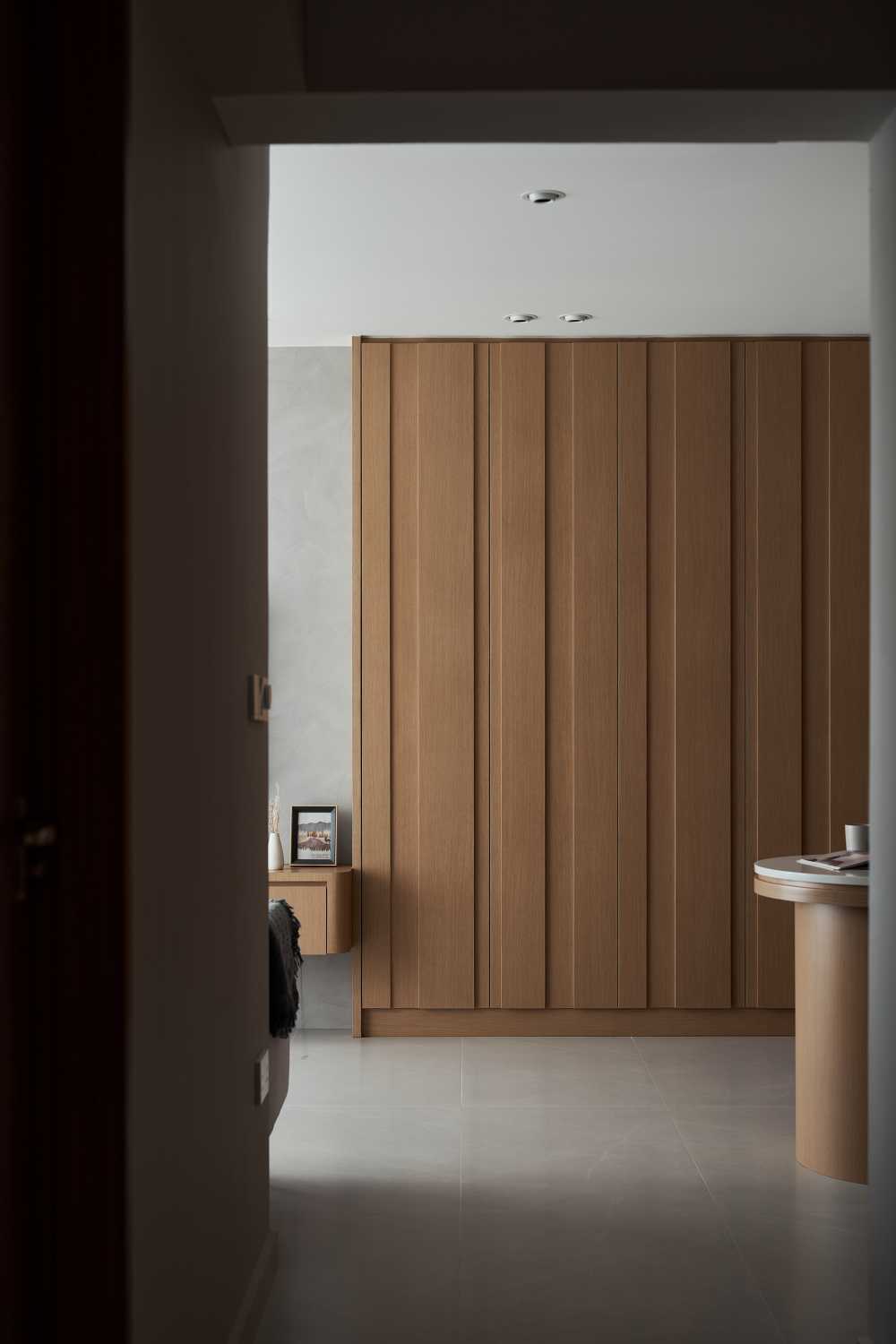 Scandinavian Living Room with Bookshelf and Ceiling Light