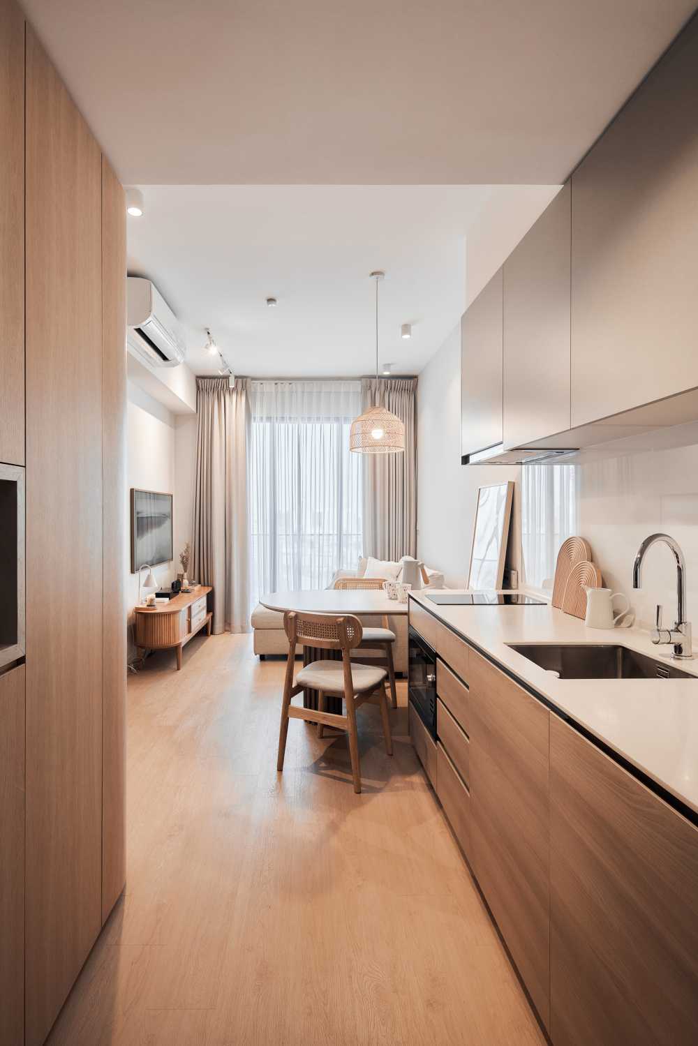 Scandinavian Foyer with Dining Table and Kitchen Tap
