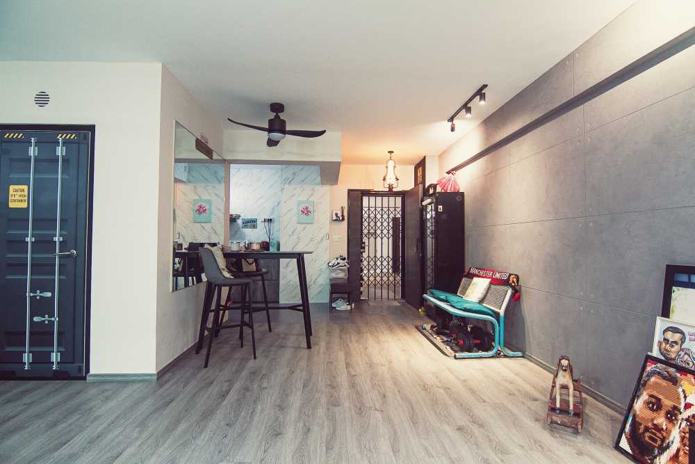 Industrial Foyer with Mirror and Artwork