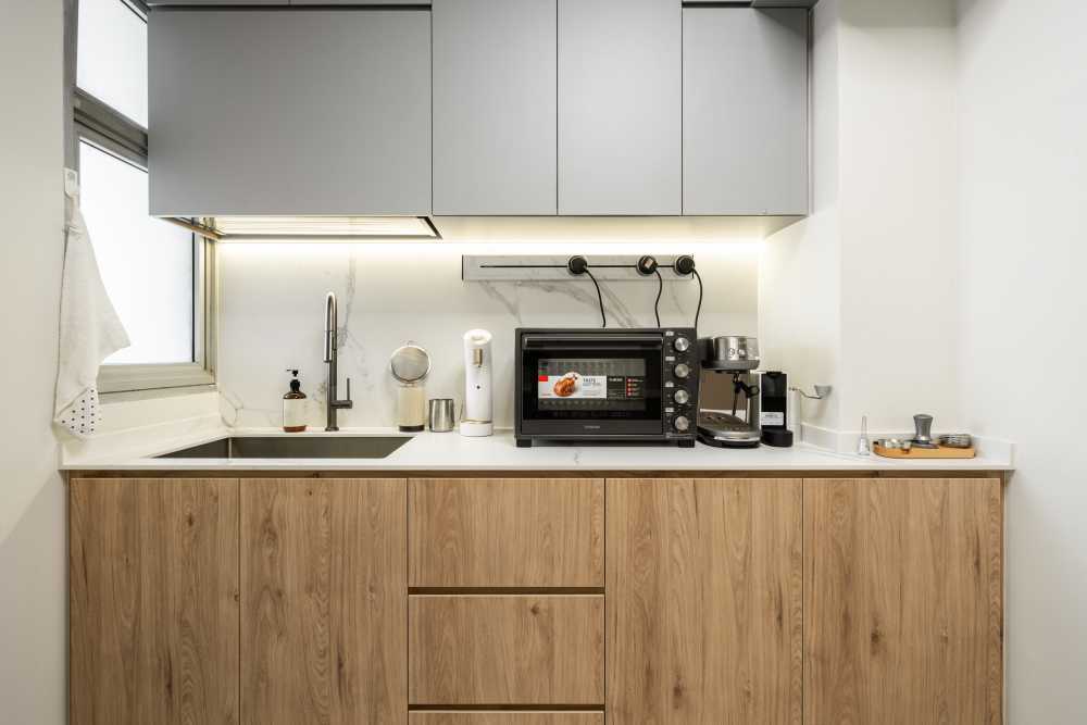 Scandinavian Kitchen with Wood Flooring and Kitchen Window