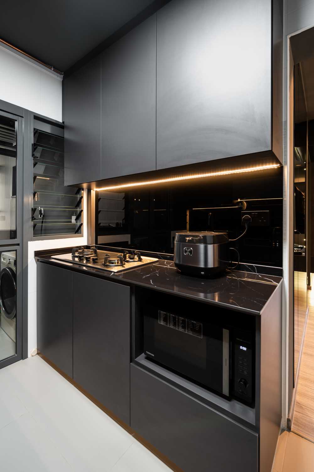 Industrial Kitchen with Wood Flooring and Kitchen Window