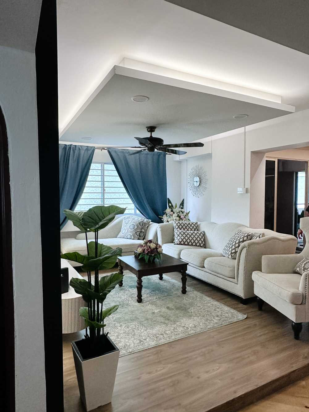Modern Living Room with Vinyl Flooring and Feature Wall