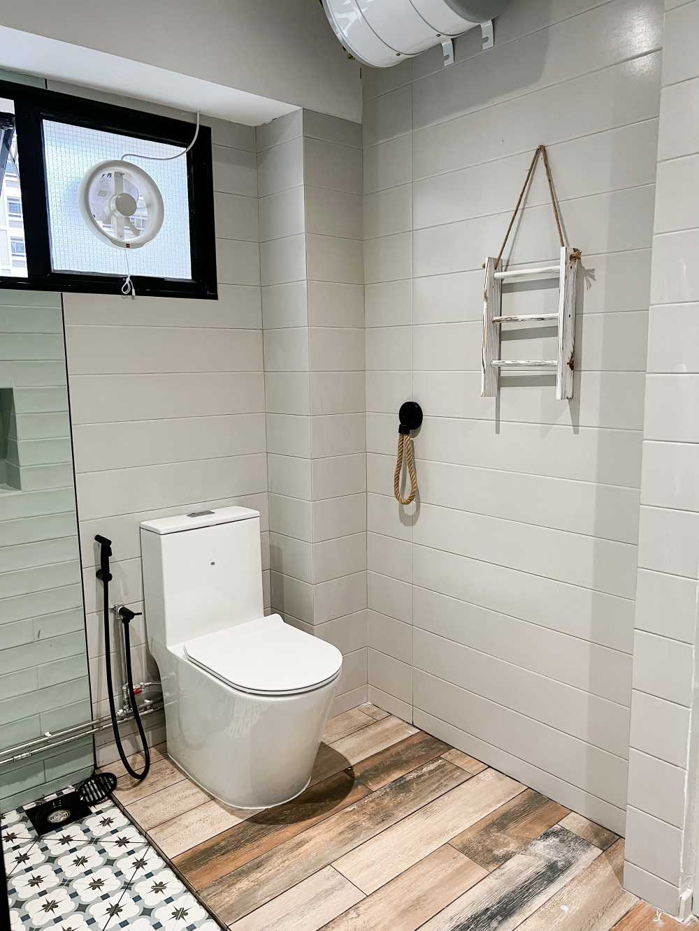 Country Bathroom with Homogeneous Tiles and Bathroom Accessories