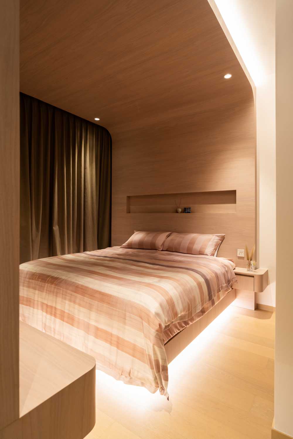 Modern Bedroom with Wood Flooring and Cove Lighting
