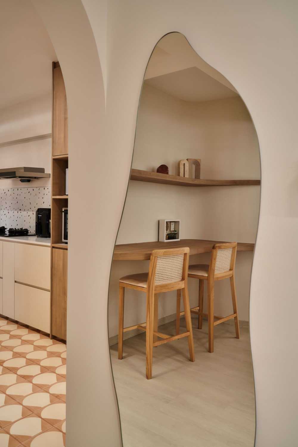 Scandinavian Living Room with Bookshelf and Mirror