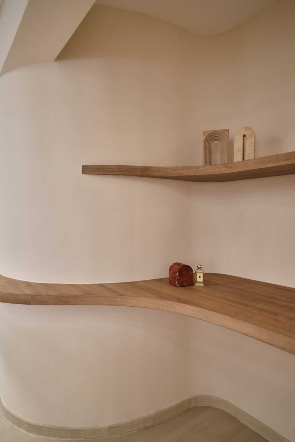 Scandinavian Living Room with Bookshelf and Wood Flooring