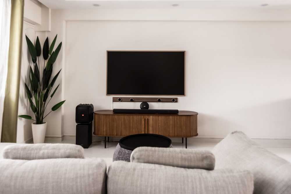 Modern Living Room with TV Console and Cove Lighting