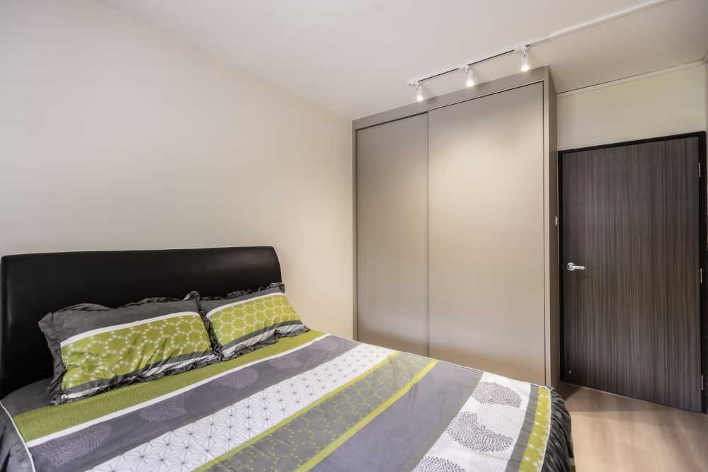 Modern Bedroom with Vinyl Flooring and Ceiling Light