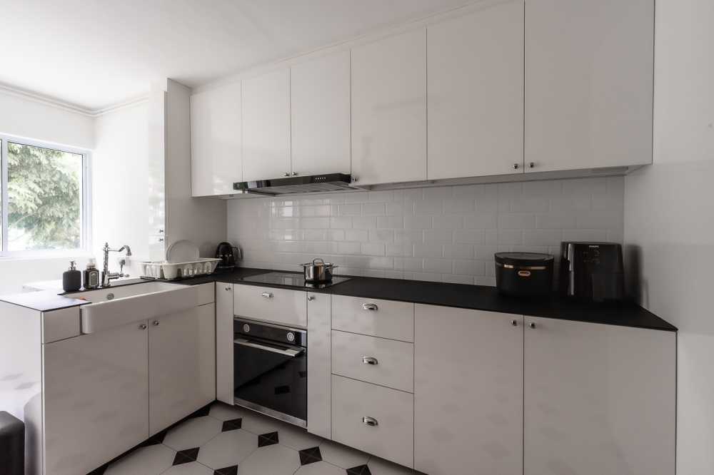 Modern Kitchen with Countertop and Kitchen Window