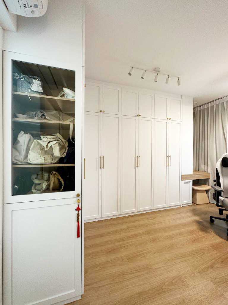 Scandinavian Bedroom with Wood Flooring and Wardrobe