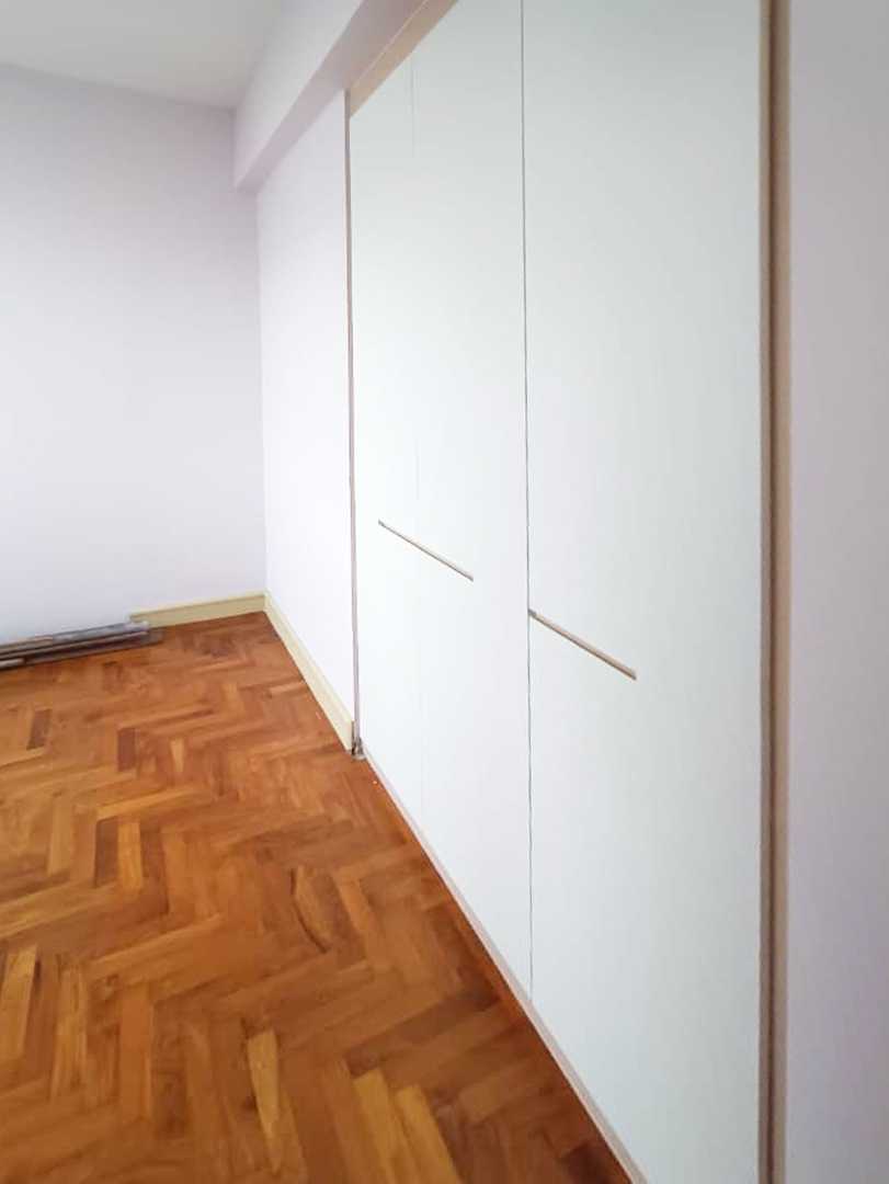 Scandinavian Bedroom with Wood Flooring and Wardrobe