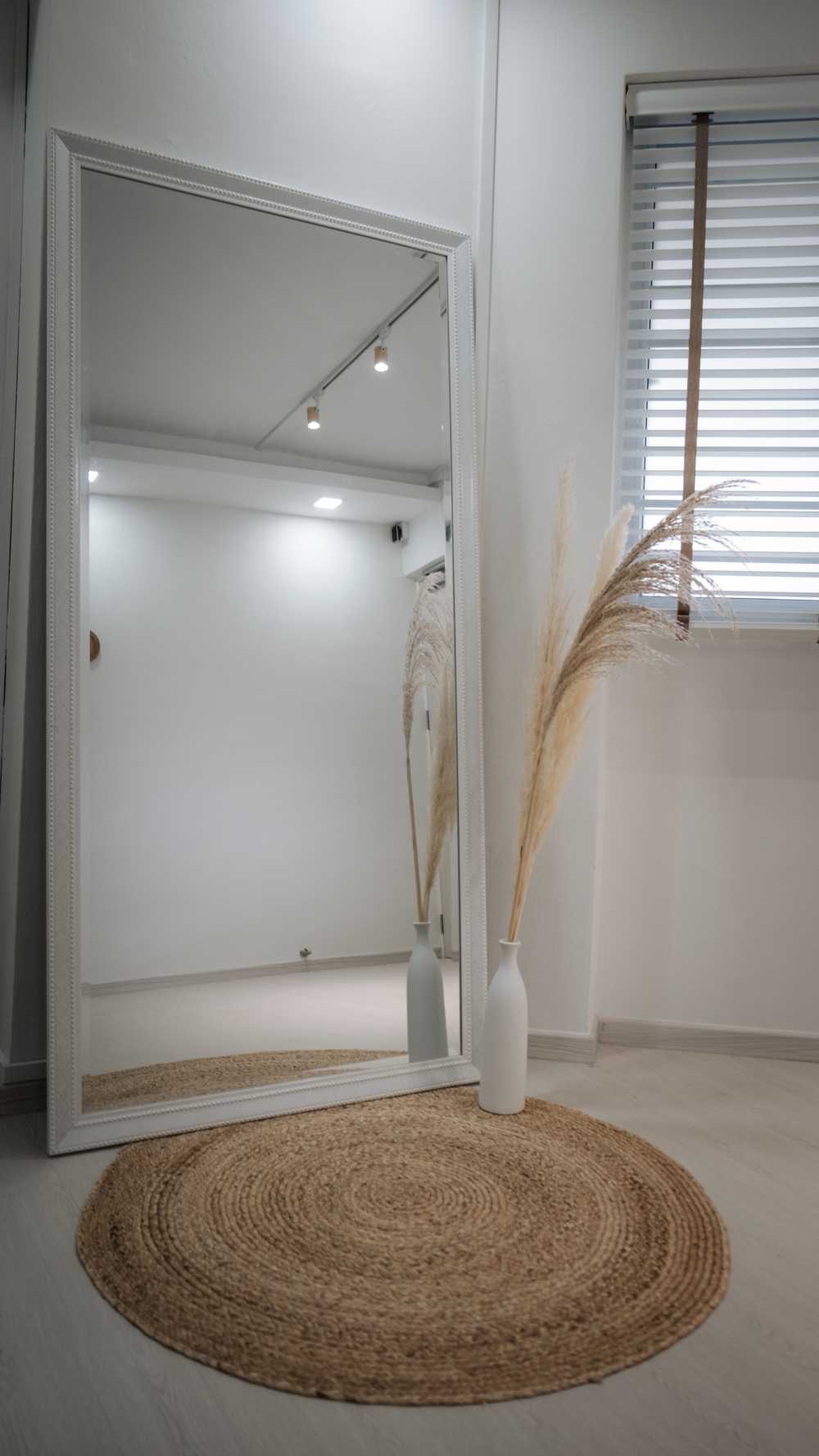 Contemporary Foyer with Artwork and Planters
