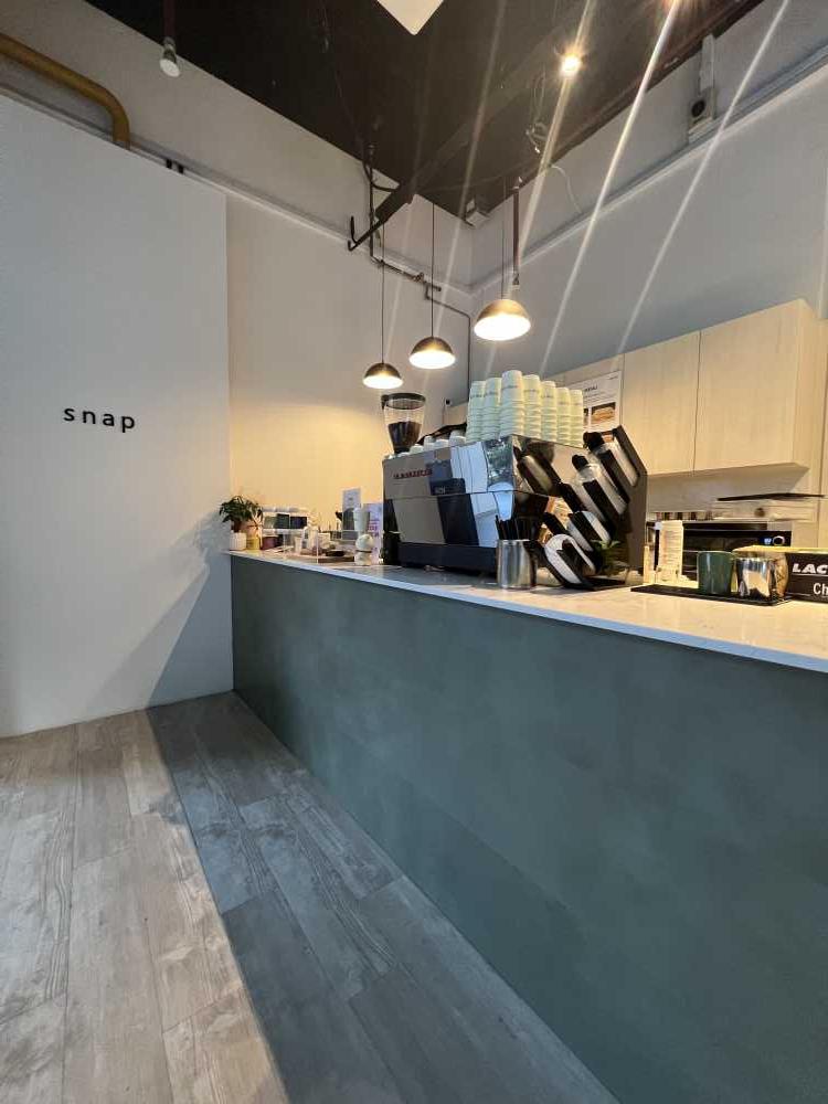 Modern Restaurant with Countertop and Vinyl Flooring
