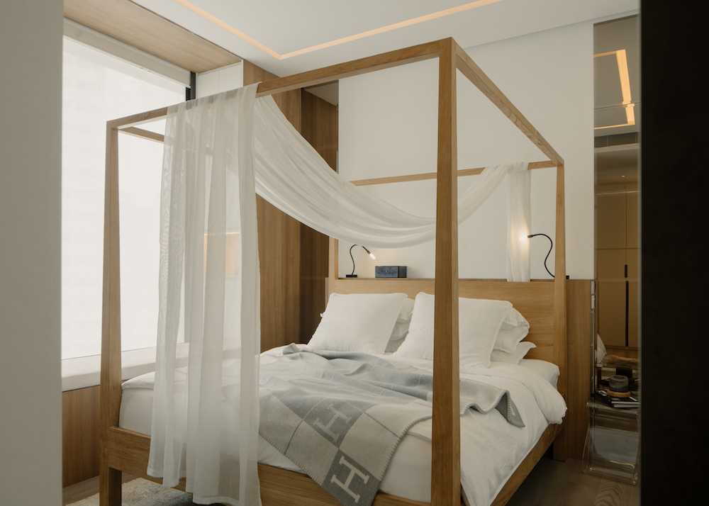 Contemporary Bedroom with Bay Window and Cove Lighting