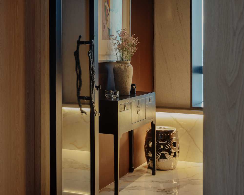 Contemporary Foyer with Artwork and Console Table
