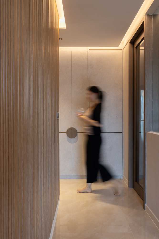 Asian Hallway with Feature Wall and Shoe Cabinets