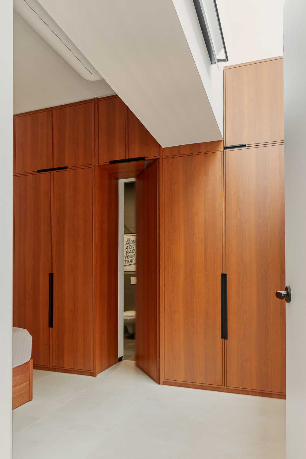 Eclectic Bedroom with Storage Cabinets and Bed