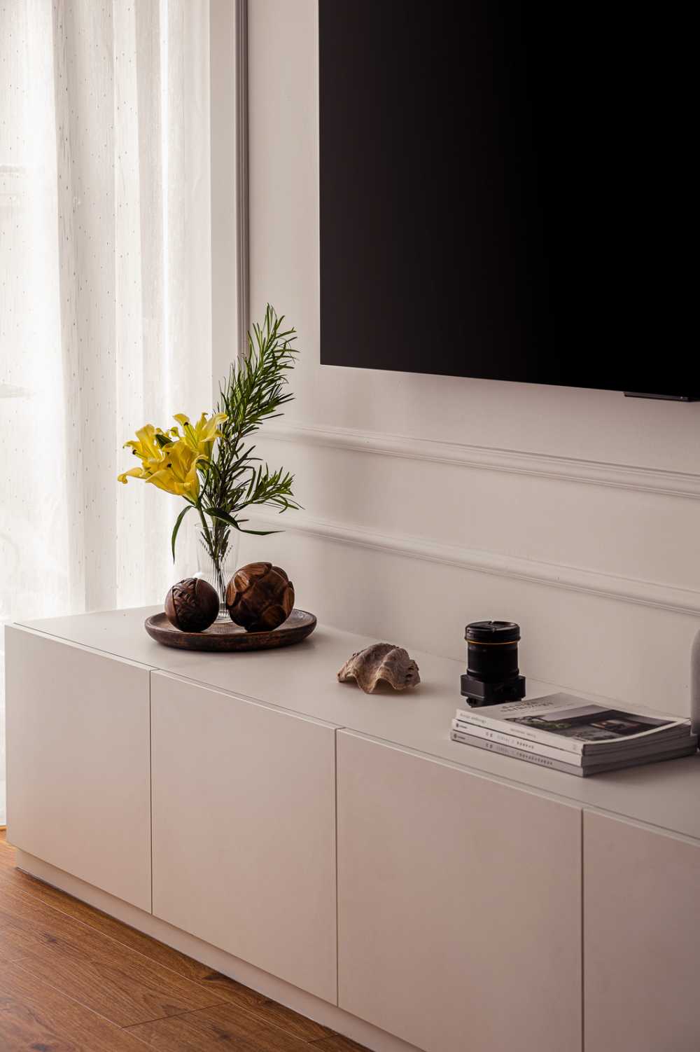 Modern Living Room with TV Console and Curtain