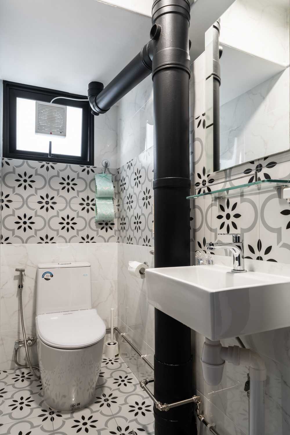 Modern Bathroom with Herringbone Tiling and Shower Screen