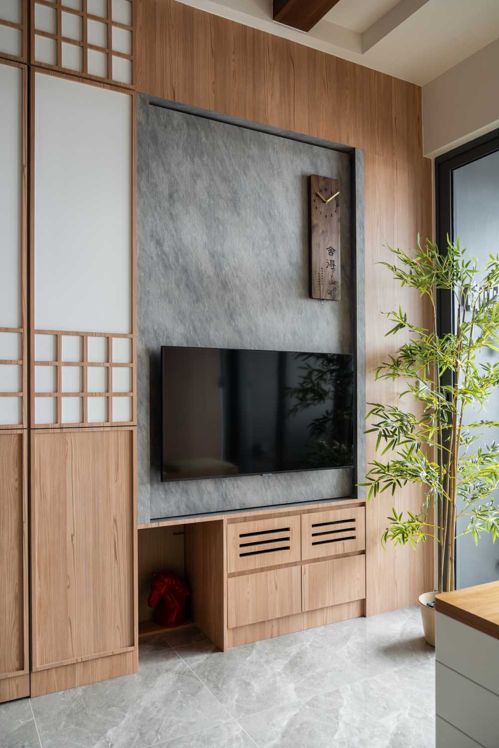 Minimalist Living Room with Homogeneous Tiles and TV Console