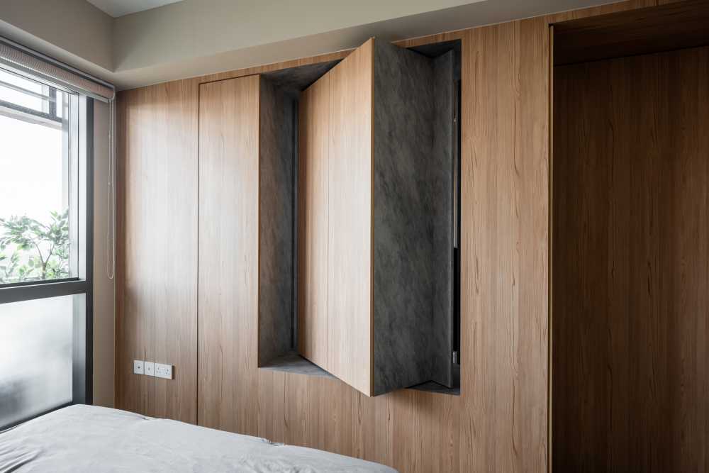 Minimalist Bedroom with Wood Flooring and Drop Light