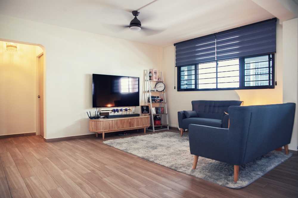 Scandinavian Living Room with Homogeneous Tiles and Carpet