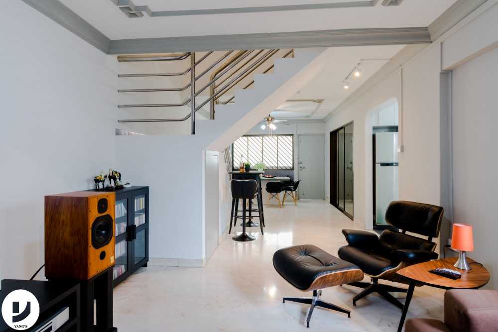 Contemporary Living Room with Bookshelf and Lamps