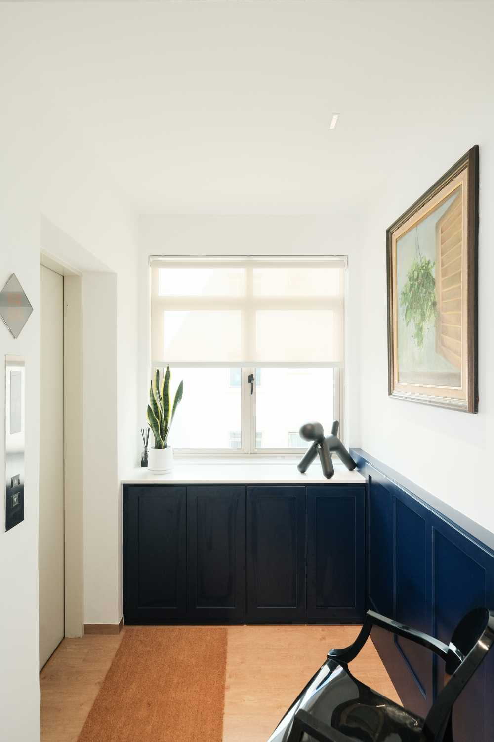 Modern Entryway with Vinyl Flooring and Storage Cabinets