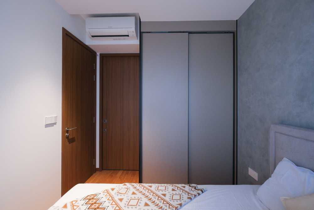 Modern Bedroom with Wood Flooring and Wardrobe