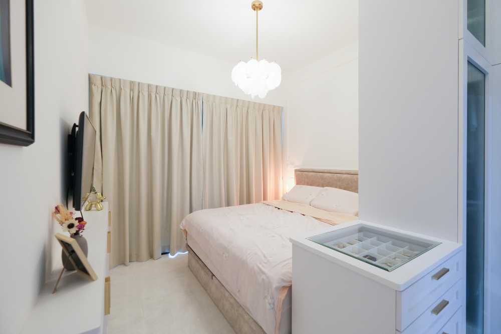 Modern Bedroom with Closet and Chandelier